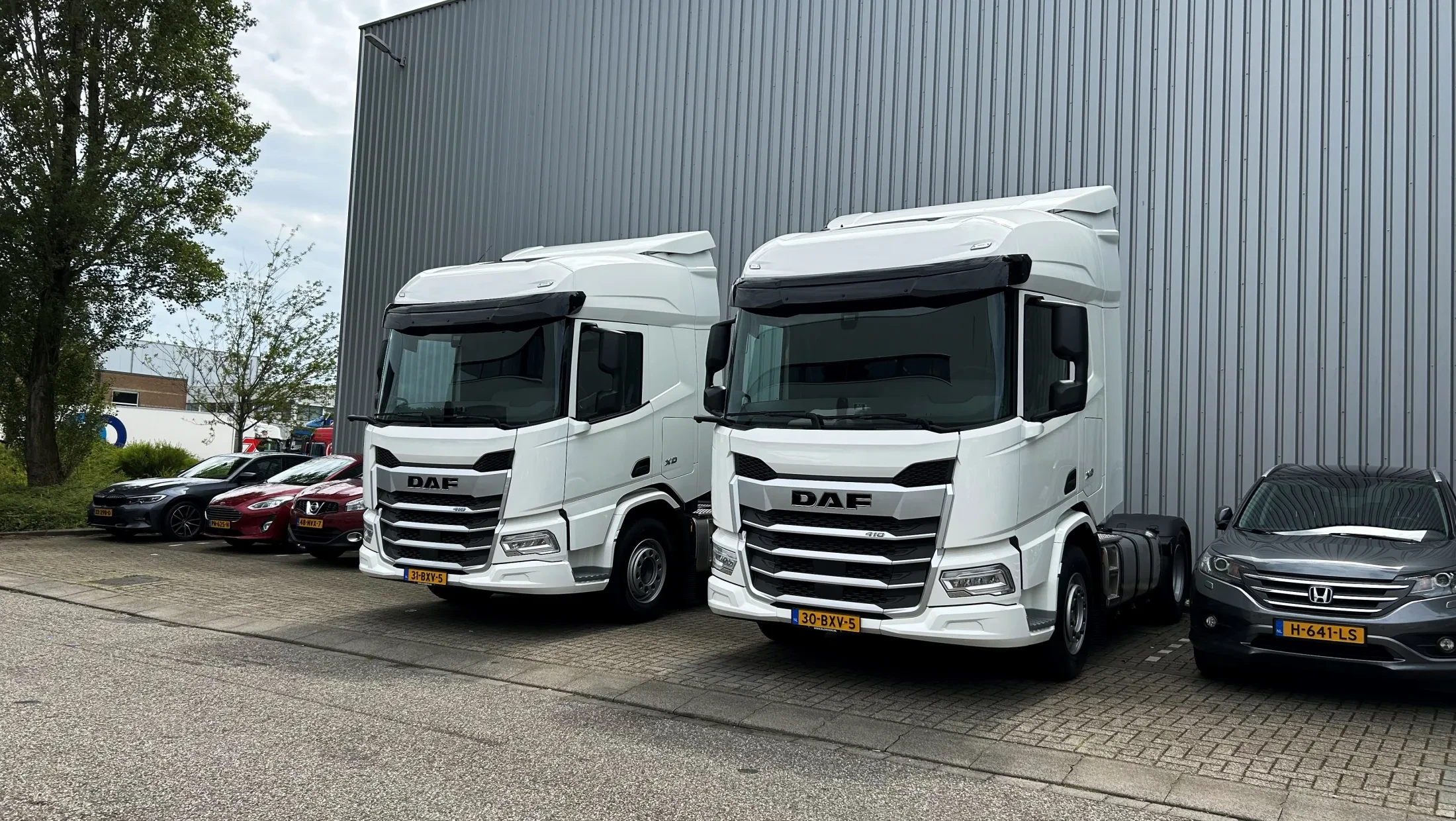 2x DAF XD 410 FT SHC NGD - Velder B.V.